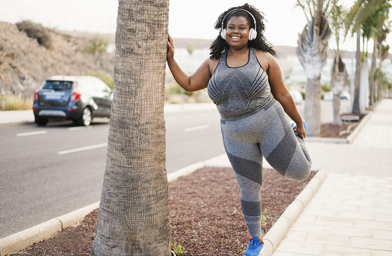 curvy-african-woman-stretching-during-workout-rout-2023-11-27-05-04-15-utc (2) (1)