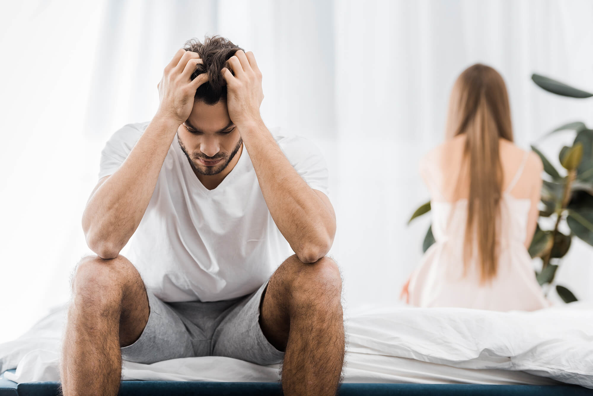 depressed-man-with-hands-on-head-having-sexual-pro-2024-11-18-22-57-01-utc (1)