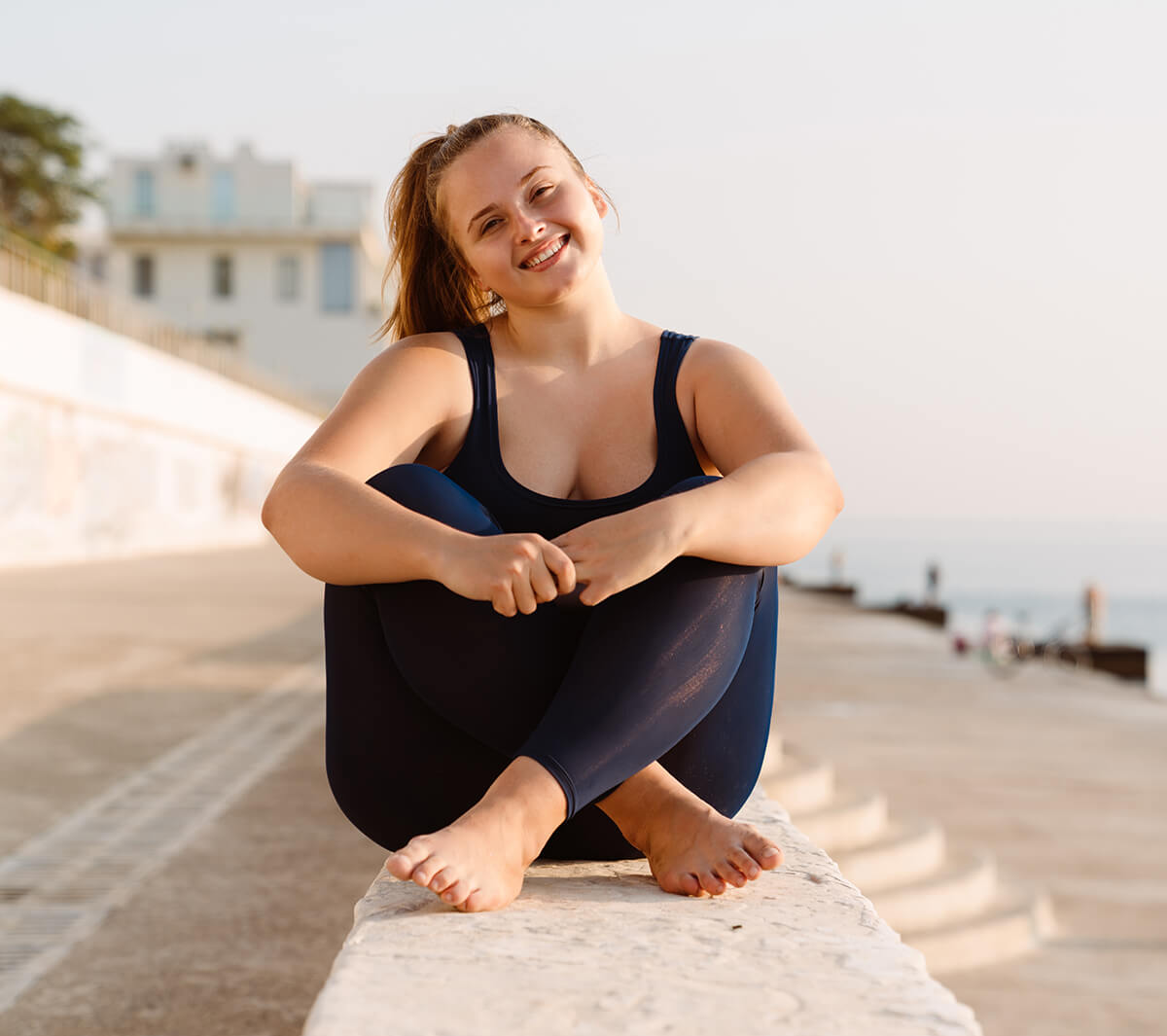 young-ginger-woman-smiling-during-yoga-practice-at-2023-11-27-05-24-26-utc (1)