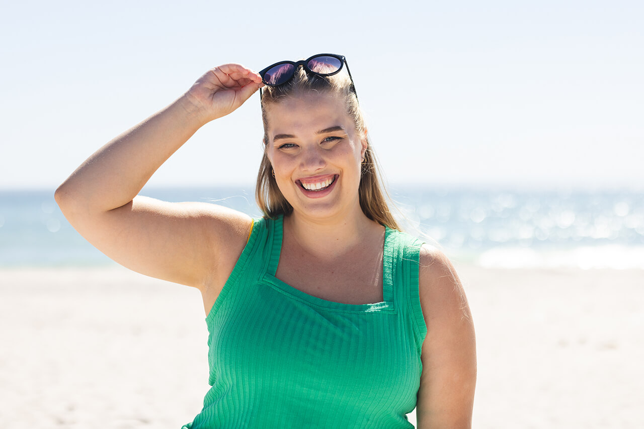 young-plus-size-caucasian-woman-enjoys-a-sunny-bea-2024-02-21-21-28-23-utc (1)