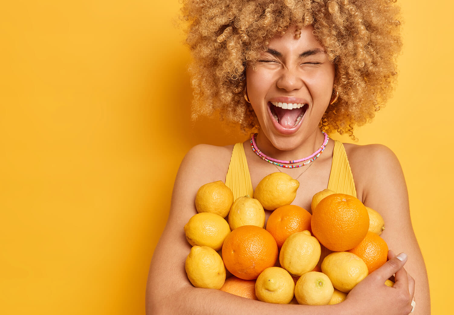 emotional-cheerful-woman-embraces-heap-of-fresh-or-2025-01-23-10-26-04-utc